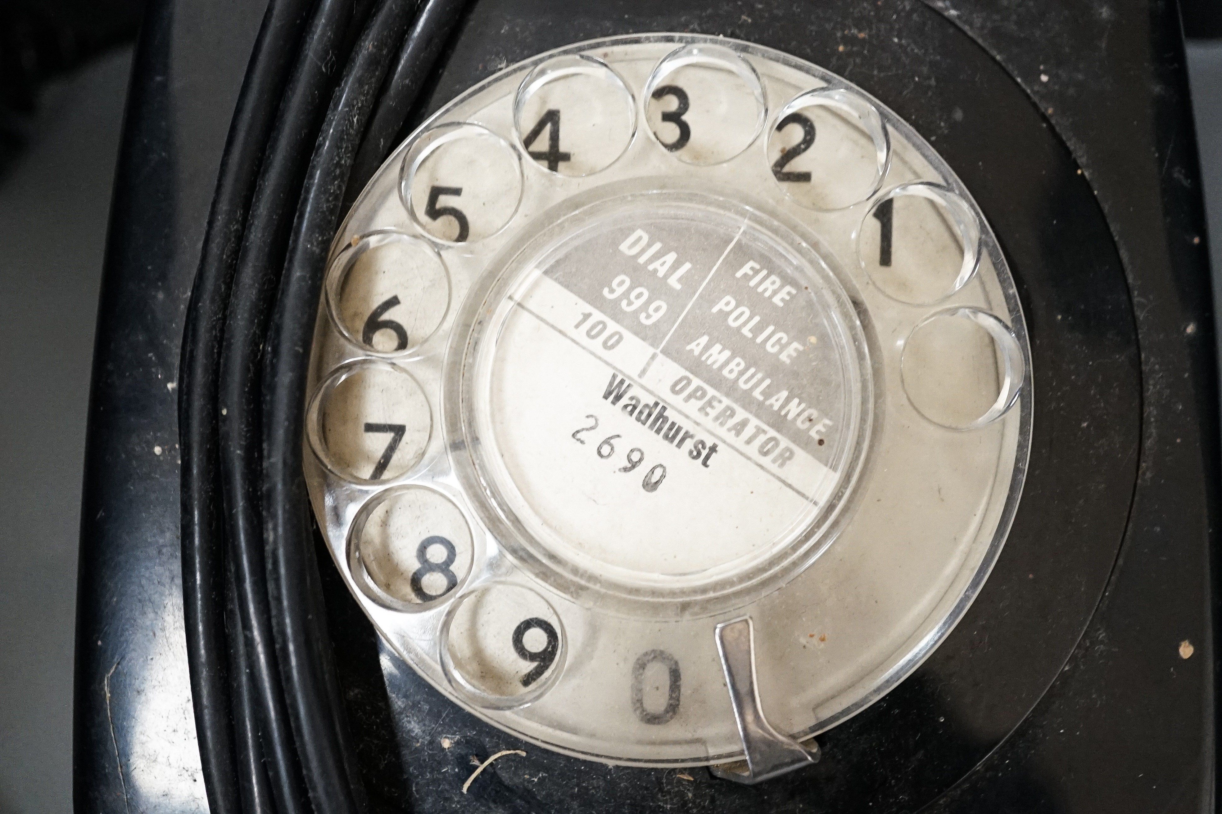 A black Bakelite telephone